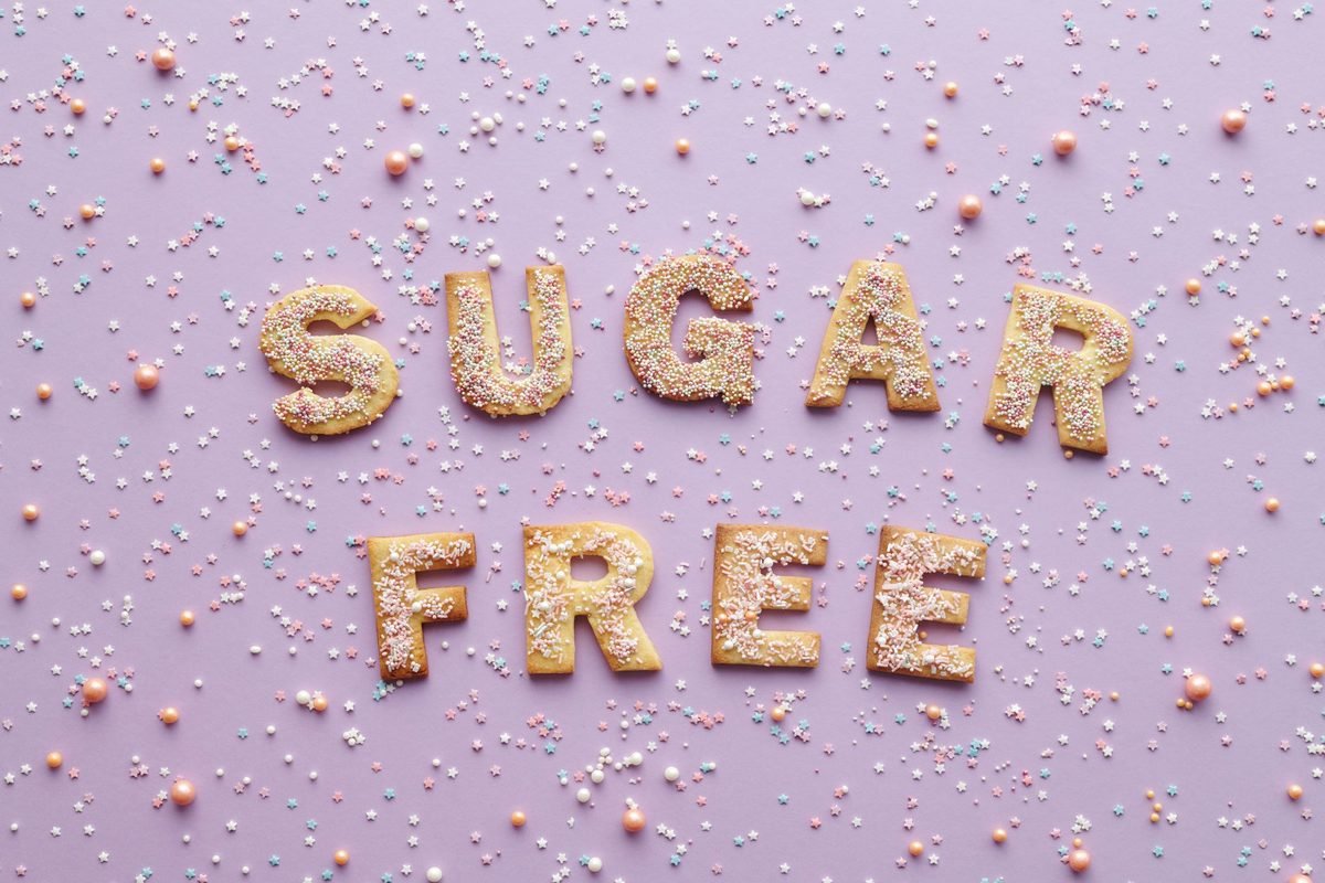 The words sugar free spelled out on a pale background